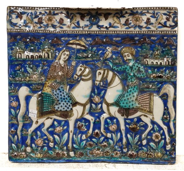 A LARGE QAJAR POTTERY TILE