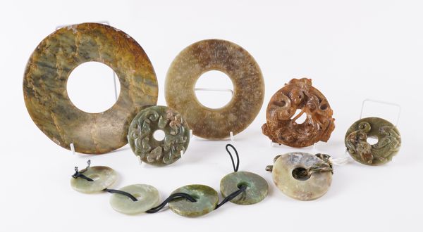 A GROUP OF TEN CHINESE ARCHAISTIC JADE DISCS