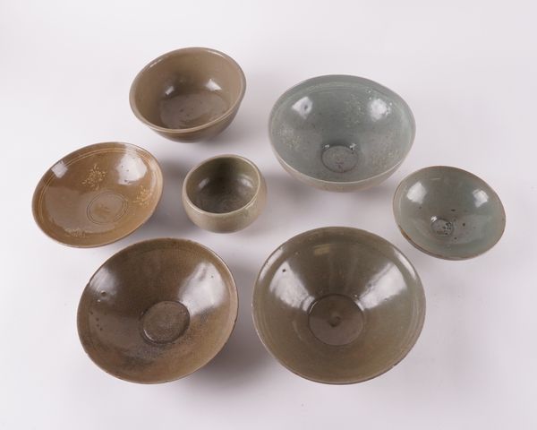 A GROUP OF SIX CELADON-GLAZED BOWLS