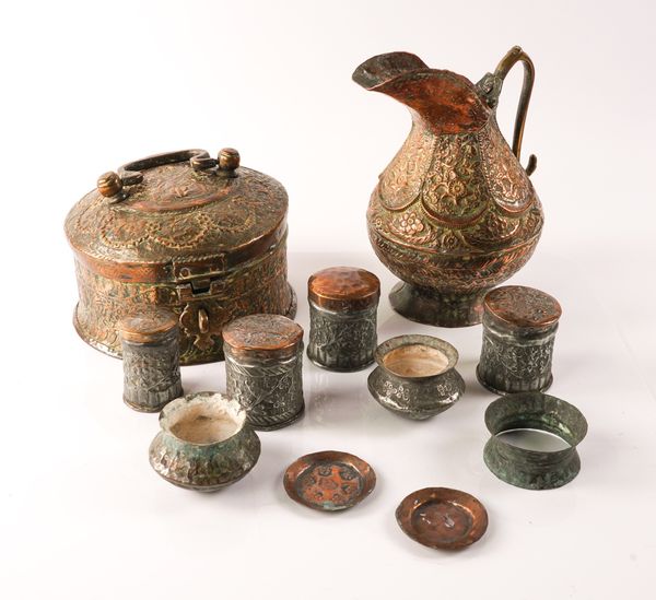 AN INDIAN COPPER BETEL NUT PANDAN BOX AND A COPPER EWER