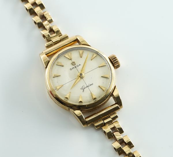 OMEGA. A LADIES 9CT GOLD MANUAL WIND BRACELET WRISTWATCH