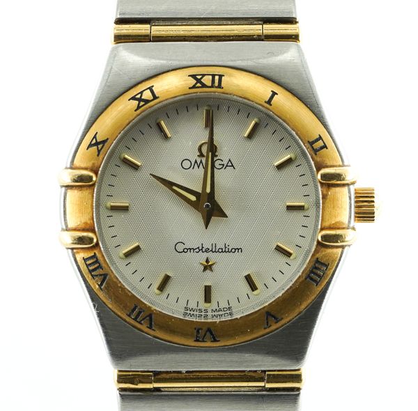 OMEGA CONSTELLATION. A LADIES GOLD & STEEL QUARTZ BRACELET WRISTWATCH