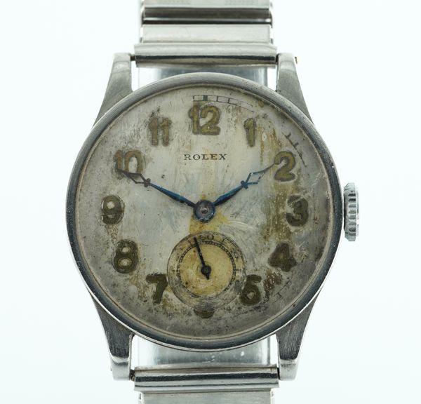 ROLEX. A STEEL CASED MANUAL WIND WRISTWATCH