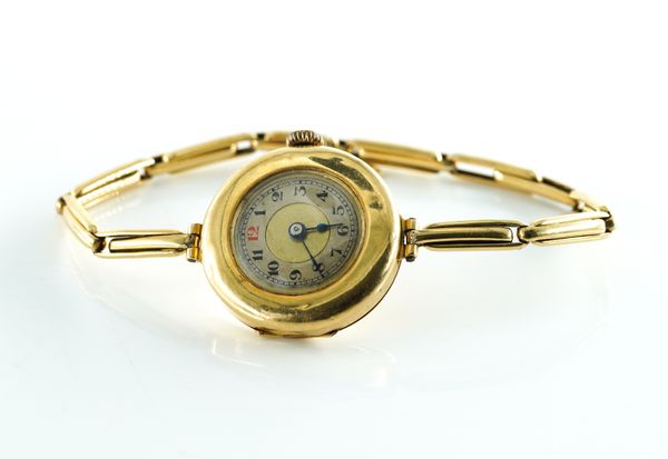 A SWISS 18K GOLD LADY'S MANUAL WIND WRISTWATCH