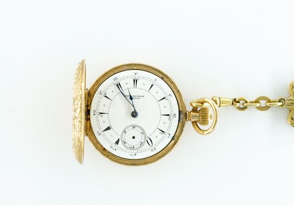 AN 18K GOLD TURKISH MARKET KEYLESS WIND HUNTING CASED FOB WATCH WITH A GILT METAL WOVEN FOB STRAP (2)