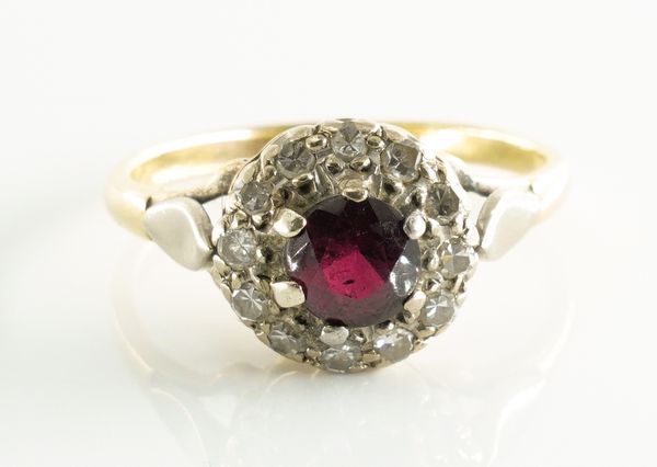 A GARNET AND DIAMOND RING