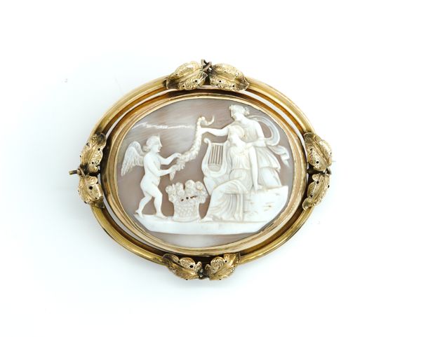 A VICTORIAN GOLD MOUNTED OVAL SHELL CAMEO BROOCH