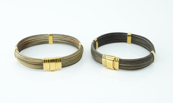 TWO GOLD MOUNTED ELEPHANT HAIR BANGLES (2)