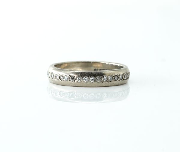 AN 18CT WHITE GOLD AND DIAMOND ETERNITY BAND RING