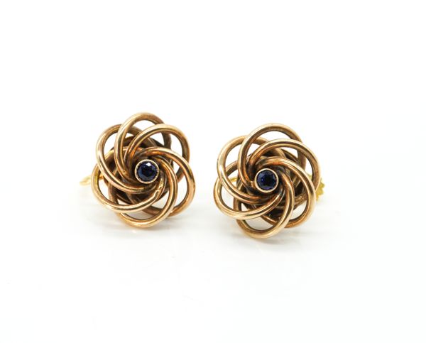 A PAIR OF GOLD AND SAPPHIRE SINGLE STONE EARRINGS