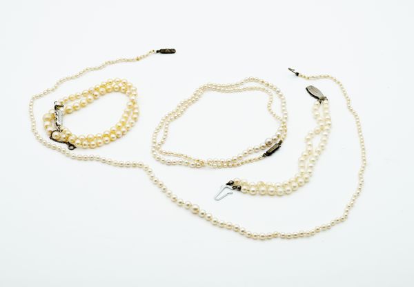 THREE CULTURED PEARL NECKLACES AND A CULTURED PEARL BRACELET (4)