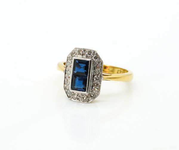 AN 18CT GOLD, SAPPHIRE AND DIAMOND CLUSTER RING