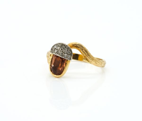 AN 18CT GOLD, TOPAZ AND DIAMOND RING