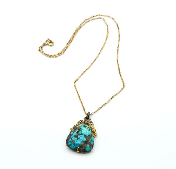 A TURQUOISE MATRIX PENDANT WITH A NECKCHAIN (2)