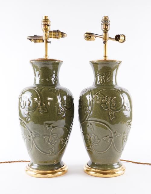 A PAIR OF SPINACH GREEN GLAZED CERAMIC BALUSTER TABLE LAMPS (2)