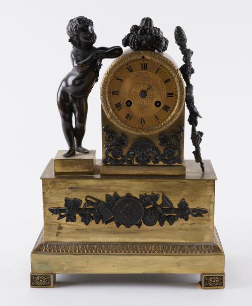 A FRENCH GILT-BRONZE MOUNTED ORMOLU MANTEL CLOCK