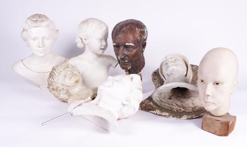 JOHN ROBINSON (BRITISH): GROUP OF PLASTER BUSTS INCLUDING QUEEN ELIZABETH II (7)