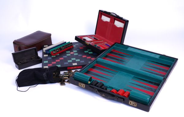 GEOFFREY PARKER;  A LEATHER BACKGAMMON SET AND OTHER GAMES SETS