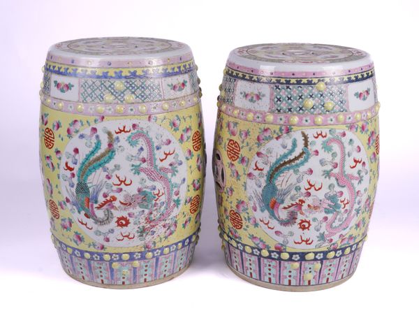 A PAIR OF CHINESE FAMILLE ROSE YELLOW GROUND GARDEN SEATS (2)