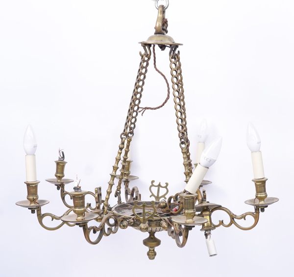 A DUTCH BRASS EIGHT LIGHT CHANDELIER