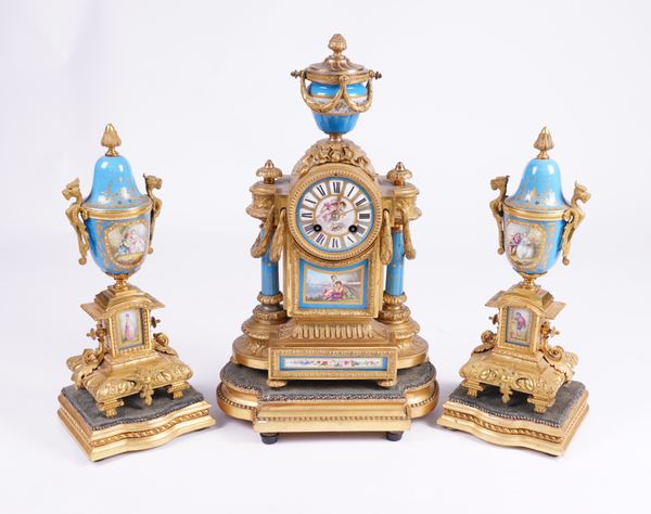 A FRENCH SEVRES-STYLE ORMOLU AND GILT METAL CLOCK GARNITURE (3)