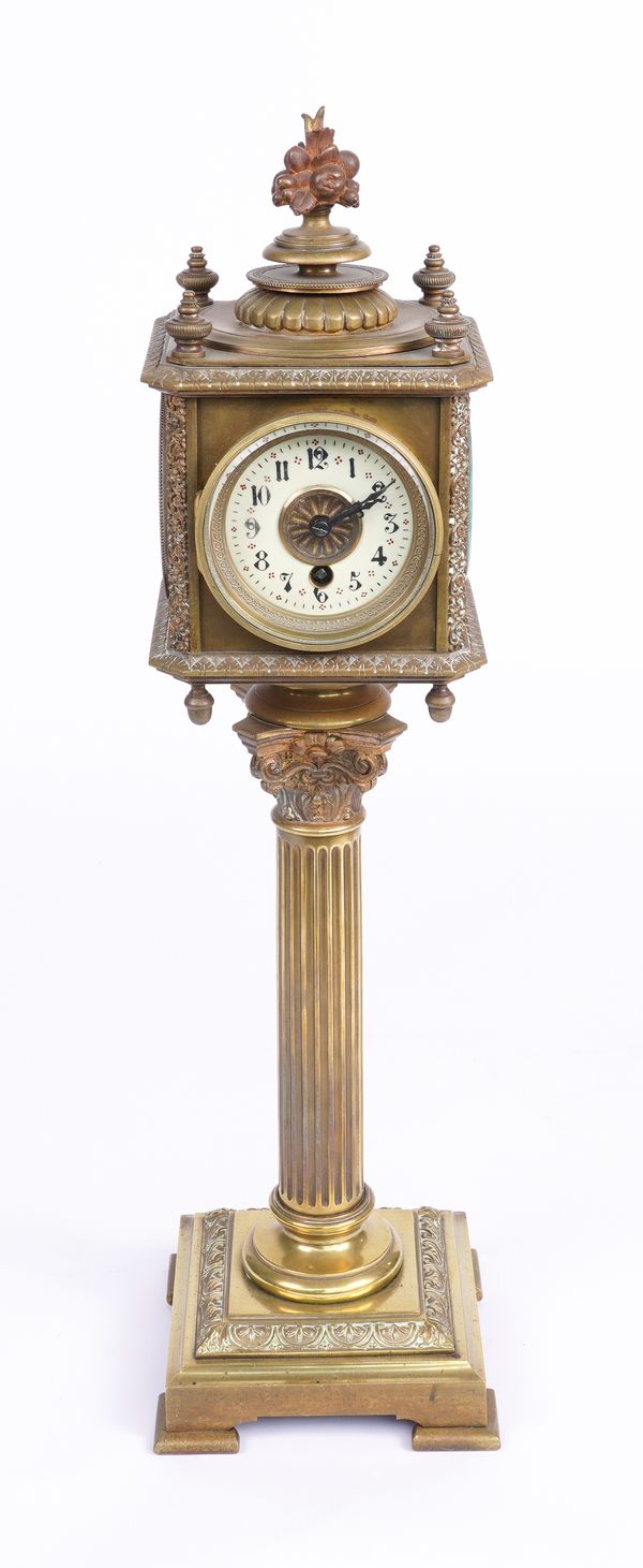 AN EDWARDIAN GILT BRASS FOUR DIAL TIMEPIECE, BAROMETER, CALENDAR AND THERMOMETER