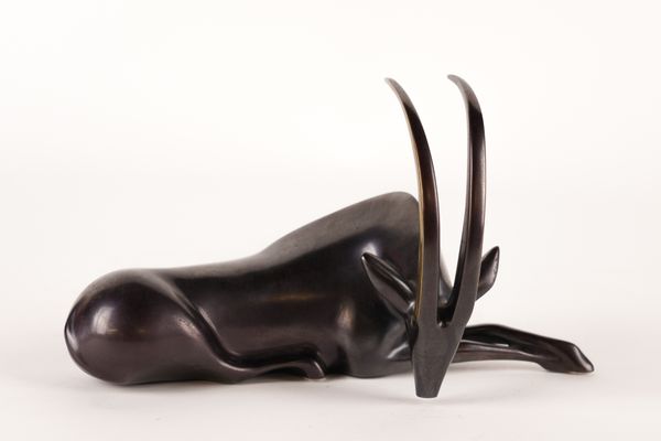 LOET VANDERVEEN (DUTCH, 1921-2015): A BRONZE SCULPTURE OF A RESTING ANTELOPE