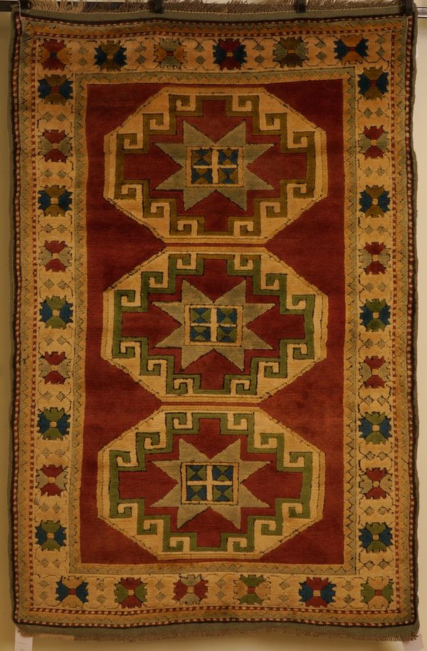 A TURKISH RUG OF CAUCASIAN DESIGN