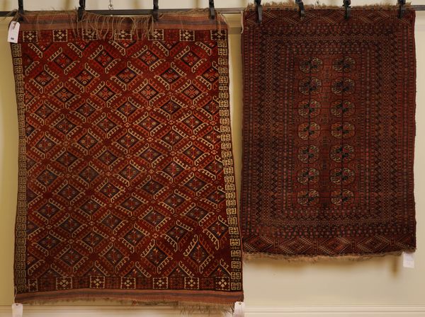 A YUMUT RUG AND A TURKMEN (2)