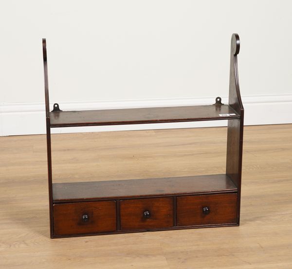 AN EARLY 19TH CENTURY MAHOGANY HANGING THREE DRAWER SPICE SHELF