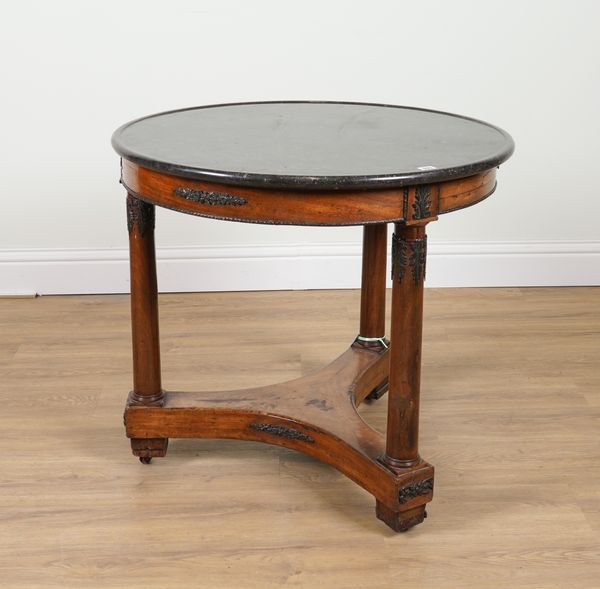 A CHARLES X MARBLE TOPPED GILT METAL MOUNTED MAHOGANY CENTRE TABLE