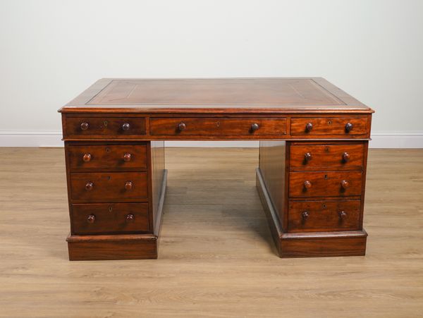 A 19TH CENTURY MAHOGANY PEDESTAL PARTNER’S DESK