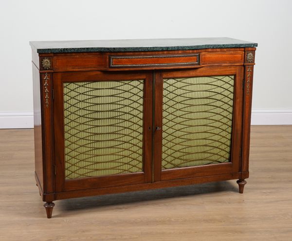 A REGENCY MARBLE TOPPED GILT METAL MOUNTED SATINWOOD AND MAHOGANY TWO DOOR SIDE CABINET