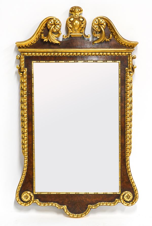 GEORGE II STYLE PARCEL-GILT WALNUT MIRROR