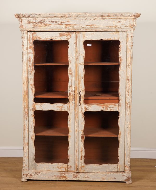 A 19TH CENTURY FRENCH DISTRESSED PAINTED FLOOR STANDING GLAZED TWO DOOR CABINET