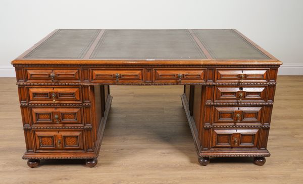 A LATE VICTORIAN RAISED GEOMETRIC MOULDED PEDESTAL PARTNER’S DESK