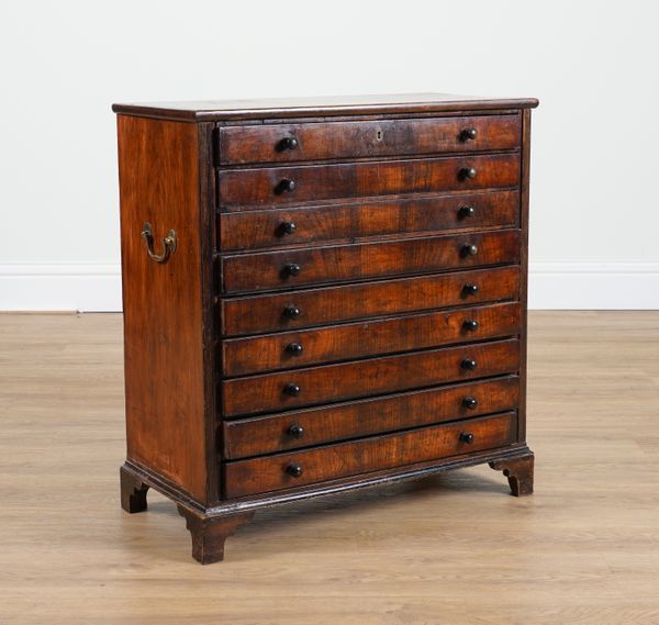 A 19TH CENTURY SMALL FRUITWOOD CHEST OF NINE LONG DRAWERS