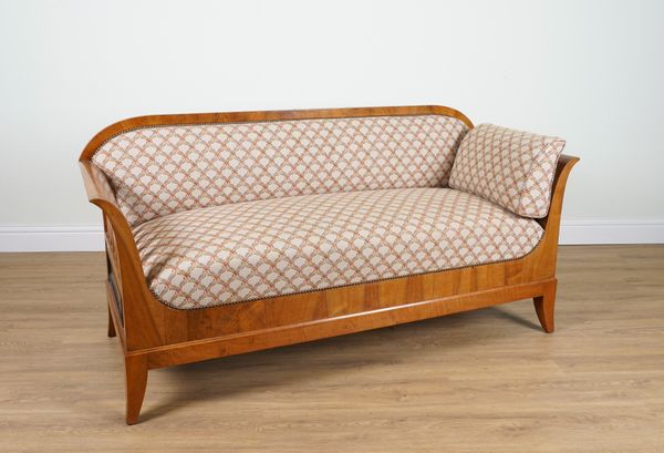 A BIEDERMEIER REVIVAL WALNUT FRAMED SOFA WITH OUTSWEPT ARMS