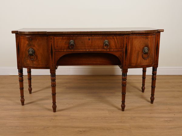 A REGENCY BRASS AND INLAID MAHOGANY BREAKFRONT SIDEBOARD