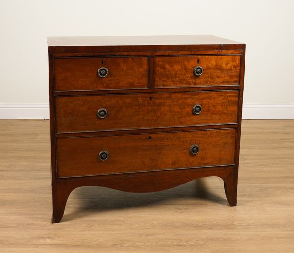 A GEORGE III MAHOGANY FOUR DRAWER CHEST OF DRAWERS ON BRACKET FEET