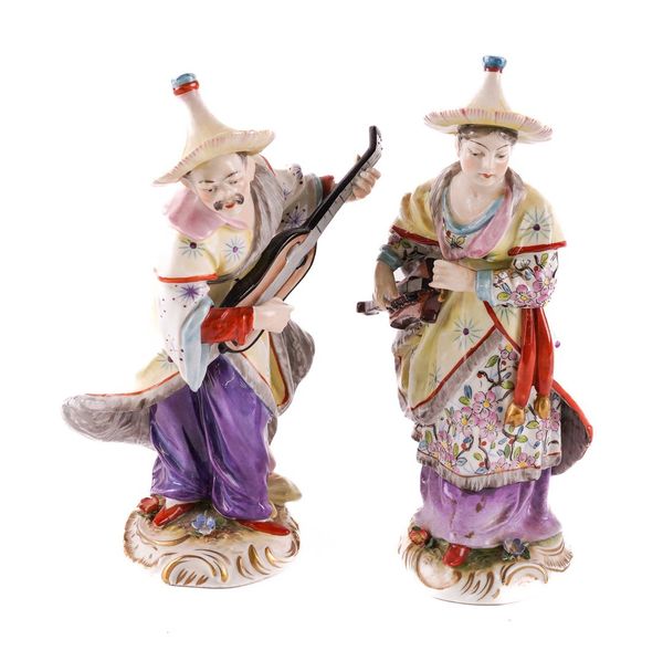 A PAIR OF VOLKSTEDT PORCELAIN FIGURES OF MALABAR MUSICIANS (2)