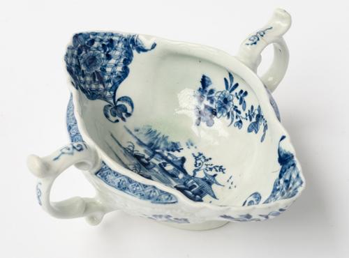 A WORCESTER BLUE AND WHITE TWO-HANDLED SAUCEBOAT