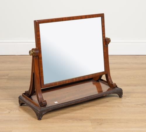 IN THE MANNER OF GILLOWS; A REGENCY MAHOGANY SPLIT BOBBIN MOUNTED TOILET MIRROR