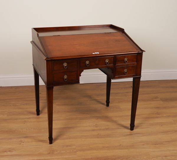 A GEORGE III MAHOGANY CLERK’S DESK