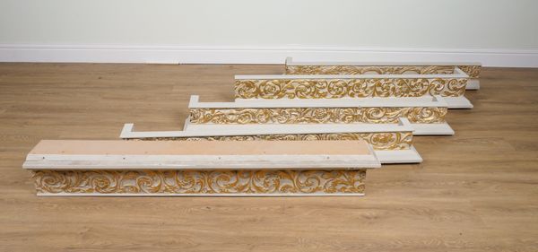 A SET OF FIVE PARCEL-GILT ACANTHUS CARVED CURTAIN PELMETS (5)