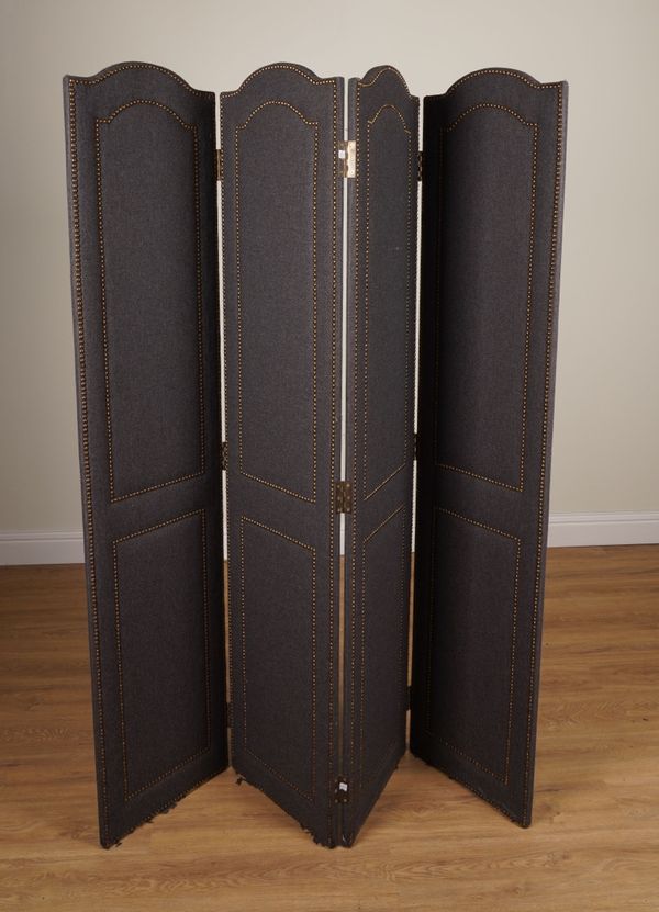 A BRASS STUDDED AND ARCH TOP FOUR-FOLD DRAUGHT SCREEN