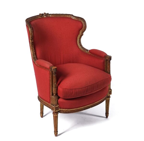 A FRENCH TRANSITIONAL STYLE  WINGBACK ARMCHAIR