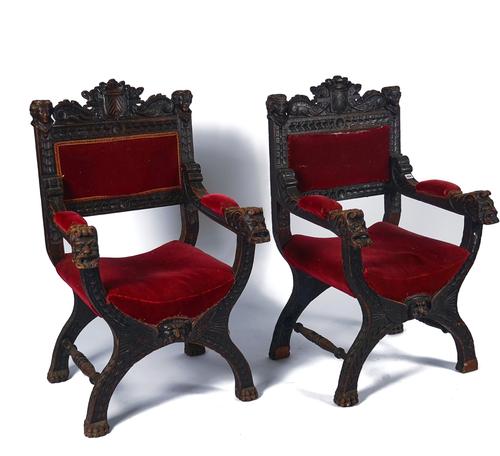 A PAIR OF 19TH CENTURY CARVED OAK OPEN ARMCHAIRS (2)