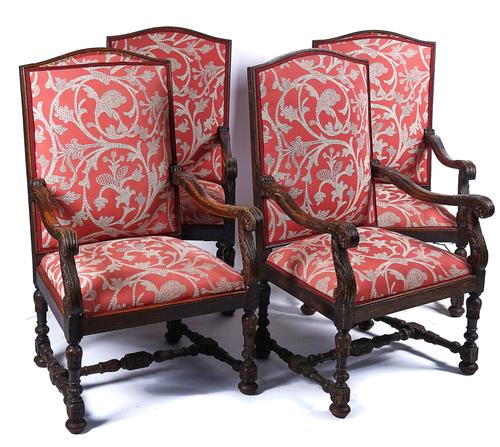 A SET OF FOUR LATE 19TH CENTURY CARVED OAK ARMCHAIRS (4)