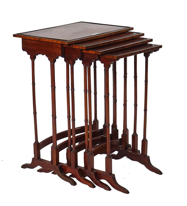 A NEST OF FOUR MAHOGANY AND KINGWOOD CROSSBANDED OCCASIONAL TABLES, CIRCA 1900